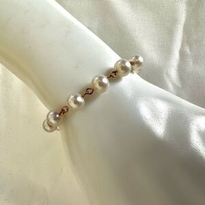 Gold tone faux pearl bracelet